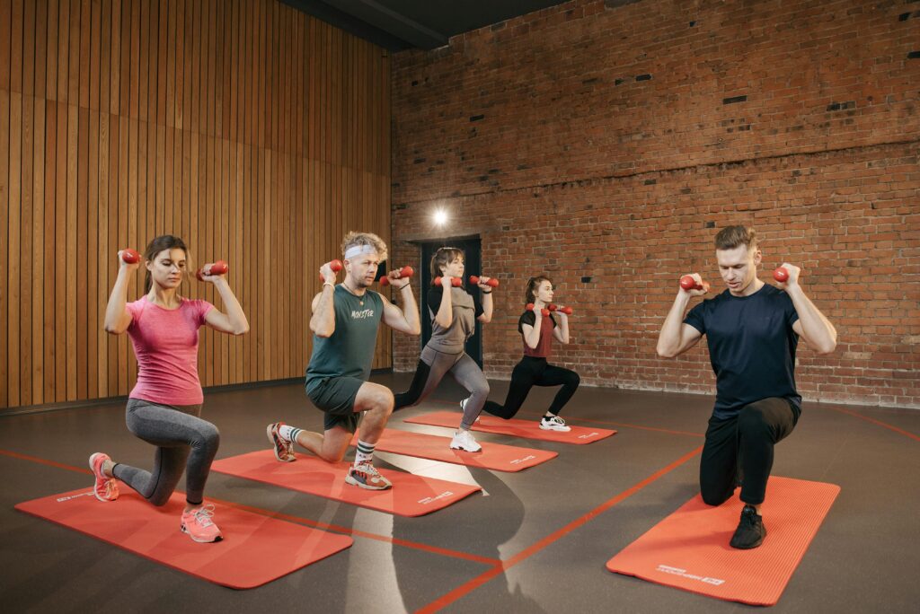 exercising with friends - one way on how to stay consistent workouts
