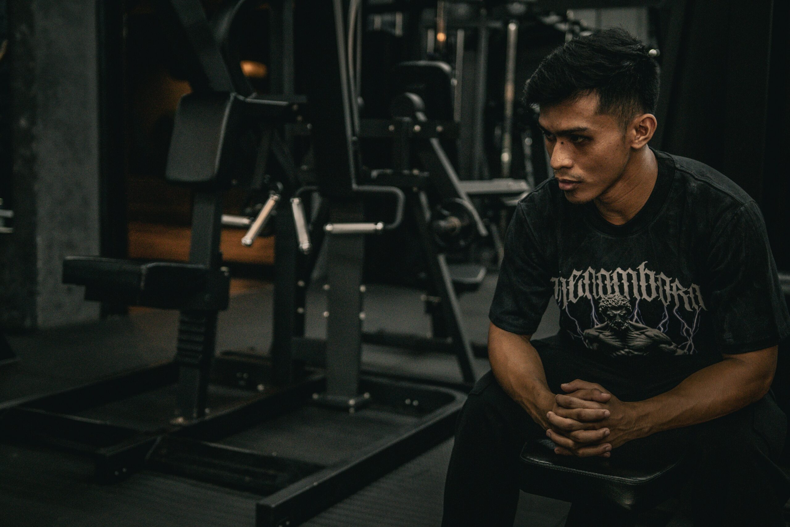 Man deciding to go for home vs gym workout